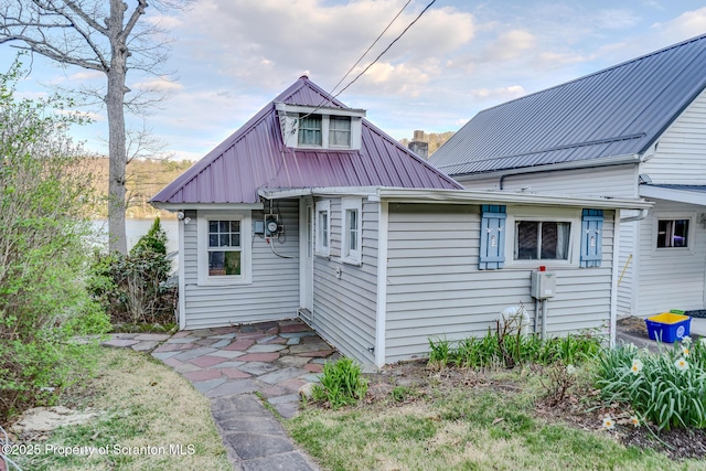 446 Lake Rd, Nicholson, PA 18446 - exterior space featuring a chimney and metal roof