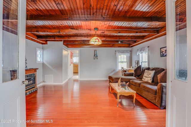 446 Lake Rd, Nicholson, PA 18446 - living room featuring baseboards, wooden ceiling, wood finished floors, beam ceiling, and visible vents
