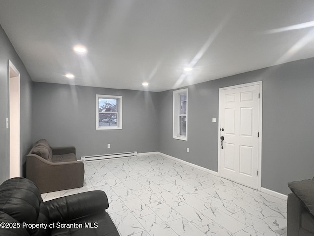 living area with a baseboard radiator