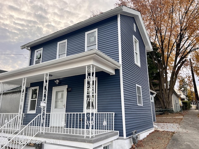 view of front of property featuring covered porch