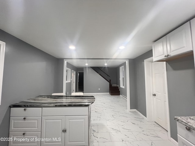 kitchen with white cabinetry