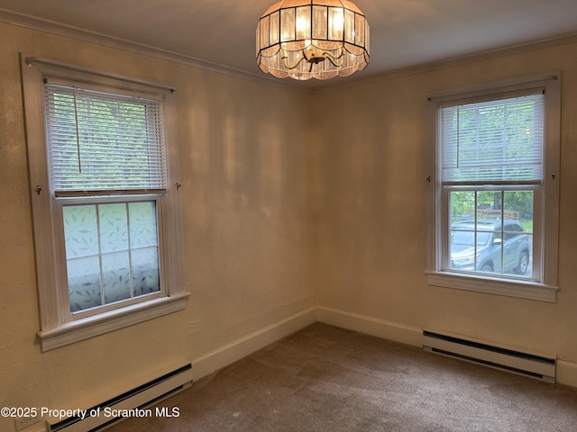 308 Marion St, Clarks Summit, PA 18411 - unfurnished room featuring a baseboard heating unit, plenty of natural light, ornamental molding, and a chandelier