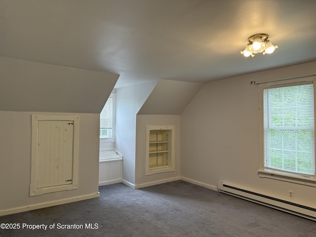 308 Marion St, Clarks Summit, PA 18411 - additional living space featuring baseboard heating, lofted ceiling, healthy amount of natural light, carpet floors, and baseboards