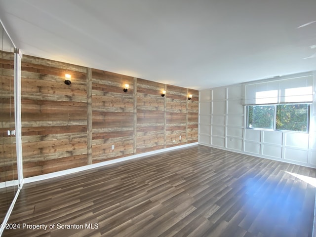 empty room featuring dark hardwood / wood-style floors