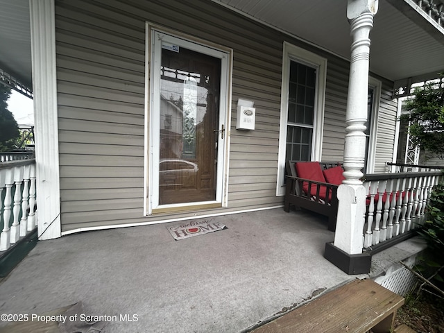 215 S Hyde Park Ave, Scranton, PA 18504 - view of exterior entry with a porch