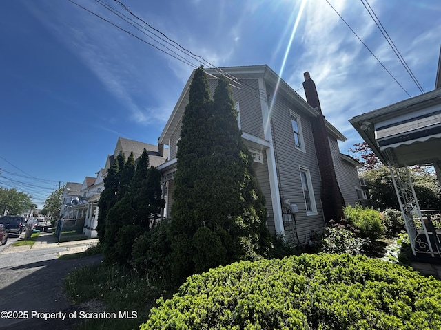 215 S Hyde Park Ave, Scranton, PA 18504 - view of side of home with a chimney