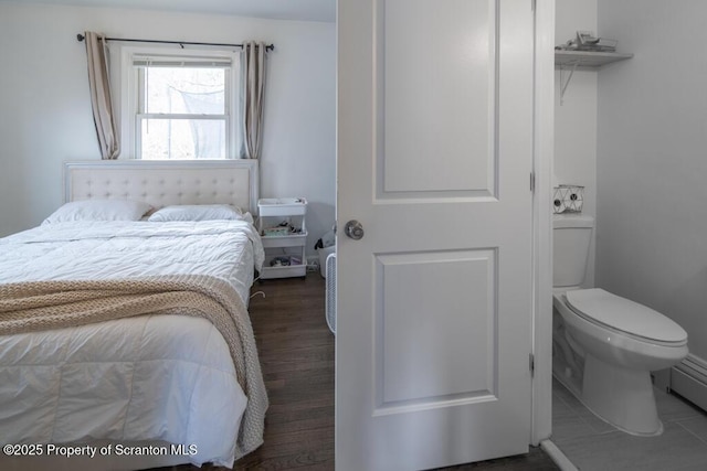 bedroom featuring wood finished floors