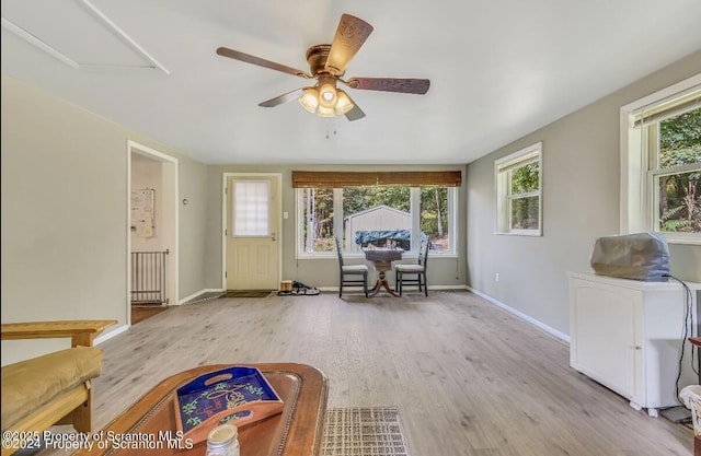 interior space featuring ceiling fan and light hardwood / wood-style floors