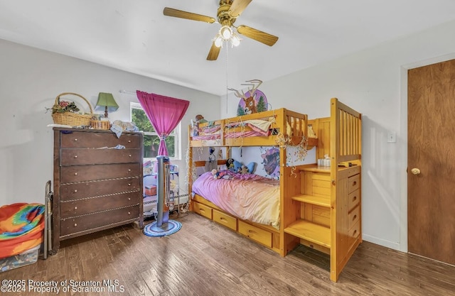 bedroom featuring ceiling fan and wood-type flooring