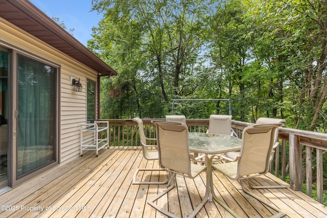 deck featuring outdoor dining space