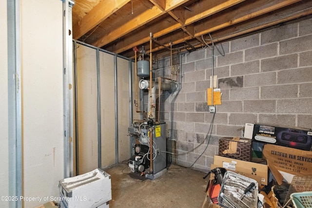 unfinished basement with a heating unit