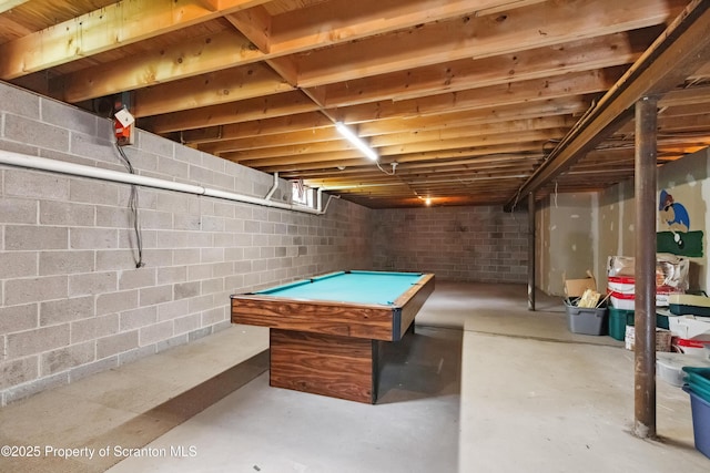 game room with concrete flooring and pool table