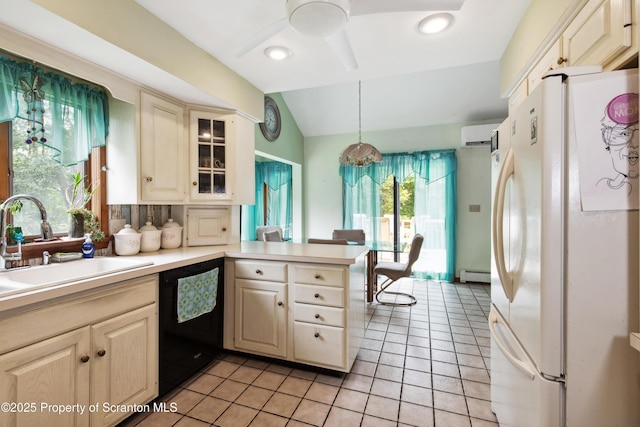 kitchen with a wall mounted AC, dishwasher, baseboard heating, vaulted ceiling, and freestanding refrigerator