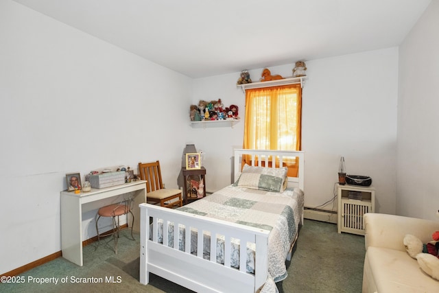 carpeted bedroom featuring baseboards and a baseboard heating unit