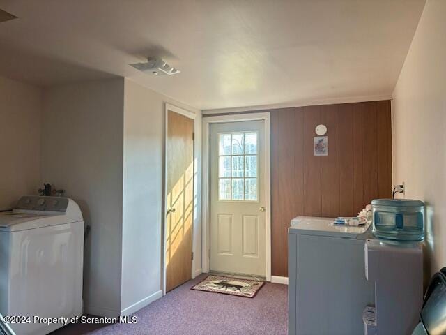 laundry area with laundry area, carpet, baseboards, and washer and dryer