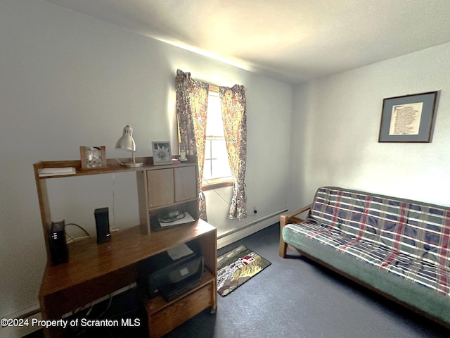 living room with a baseboard heating unit