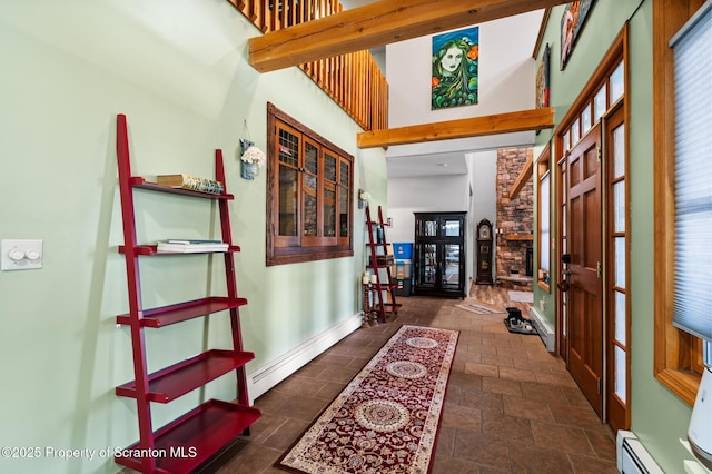 hall featuring french doors and a baseboard radiator