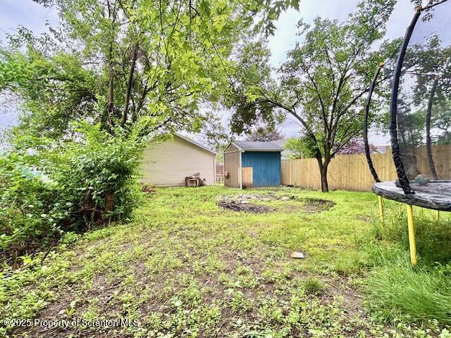286 Meridian Ave, Scranton, PA 18504 - view of yard featuring a trampoline and a storage unit