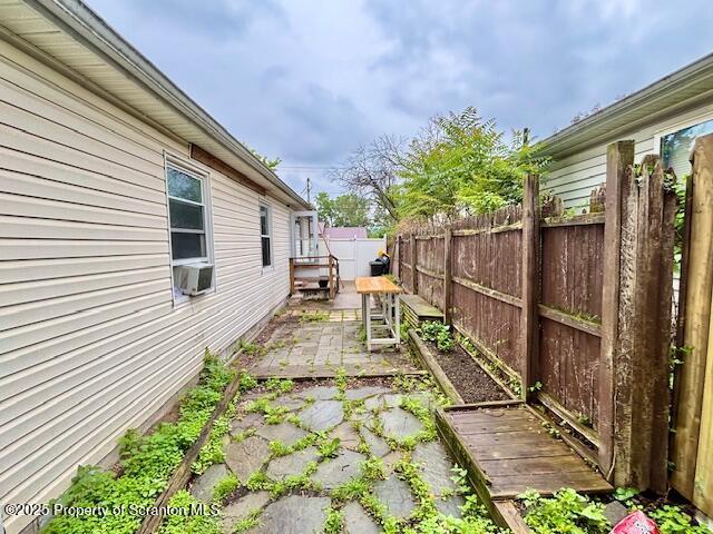 286 Meridian Ave, Scranton, PA 18504 - fenced backyard with a garden, a patio area, and cooling unit