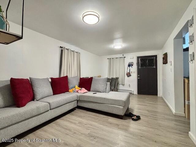 286 Meridian Ave, Scranton, PA 18504 - living area with wood finished floors and baseboard heating