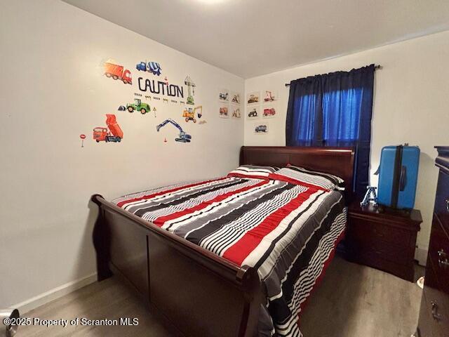 286 Meridian Ave, Scranton, PA 18504 - bedroom with baseboards and wood finished floors