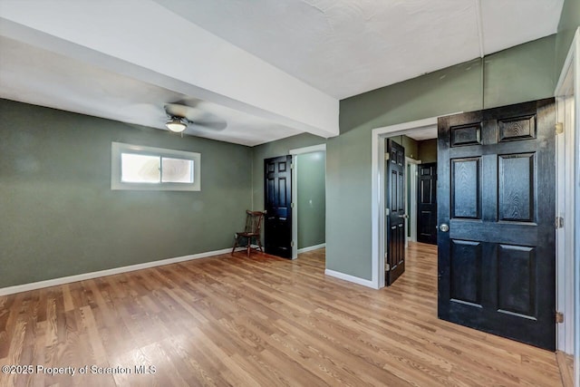 unfurnished bedroom featuring light wood-type flooring