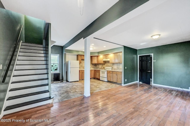 unfurnished living room featuring light hardwood / wood-style flooring