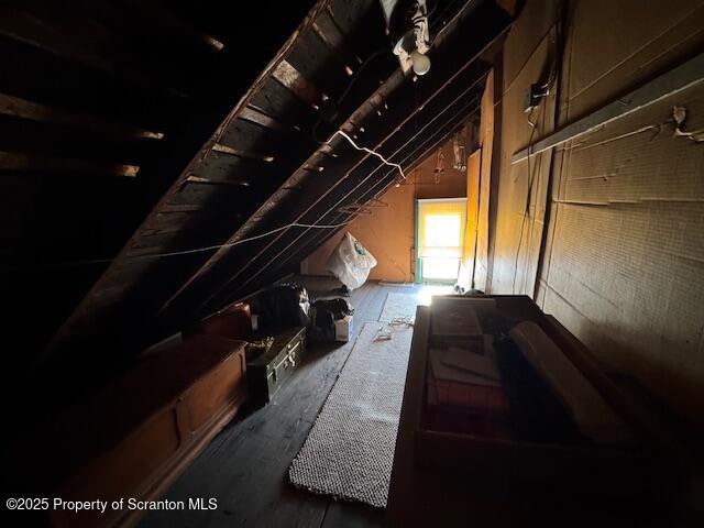 view of unfinished attic