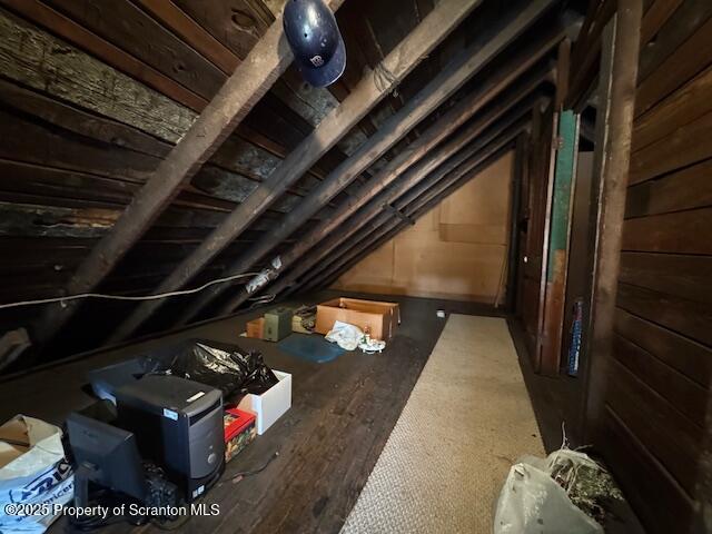 view of unfinished attic