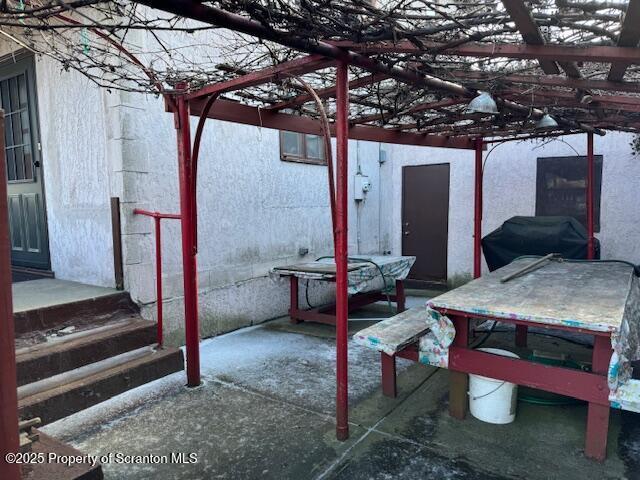 view of patio with a pergola