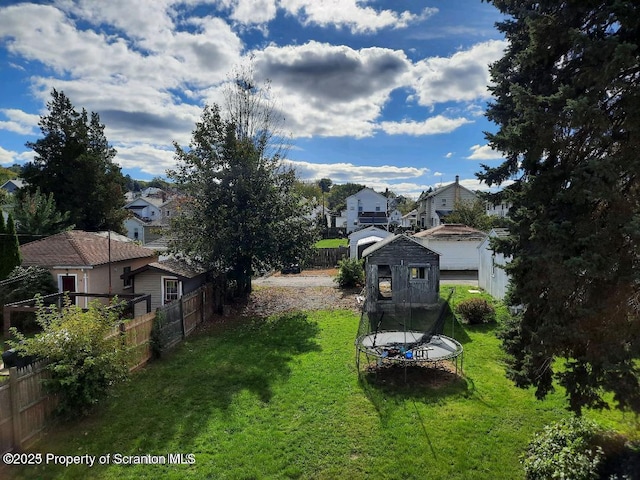 view of yard with a trampoline