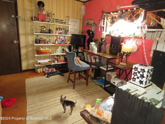 interior space featuring wood walls