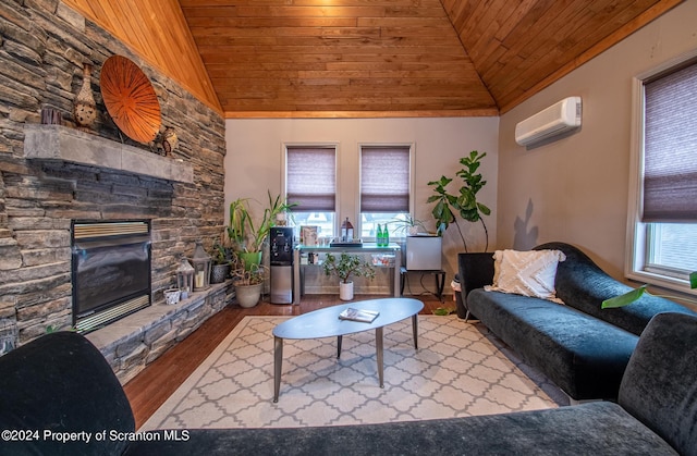 living room with wooden ceiling, a stone fireplace, a wall unit AC, vaulted ceiling, and hardwood / wood-style flooring