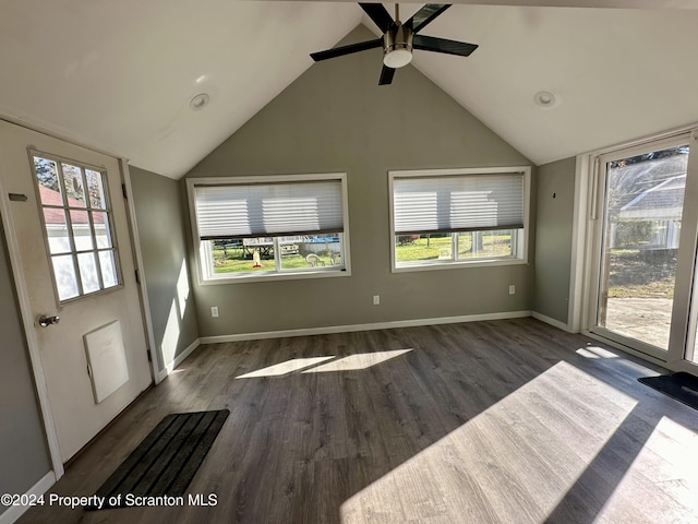 interior space featuring vaulted ceiling, ceiling fan, and dark hardwood / wood-style floors