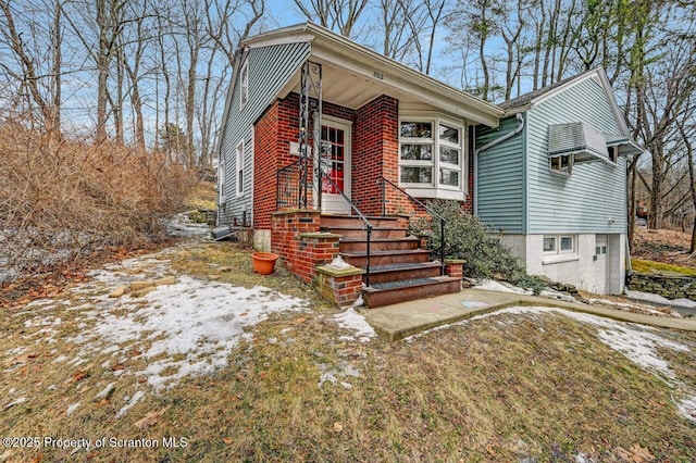 view of front of property with brick siding