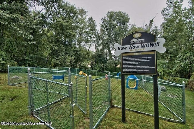 view of property's community with fence