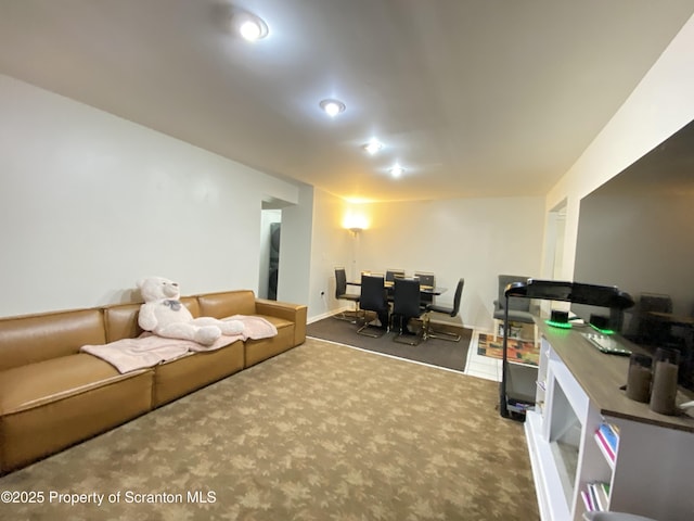 carpeted living room with baseboards and recessed lighting