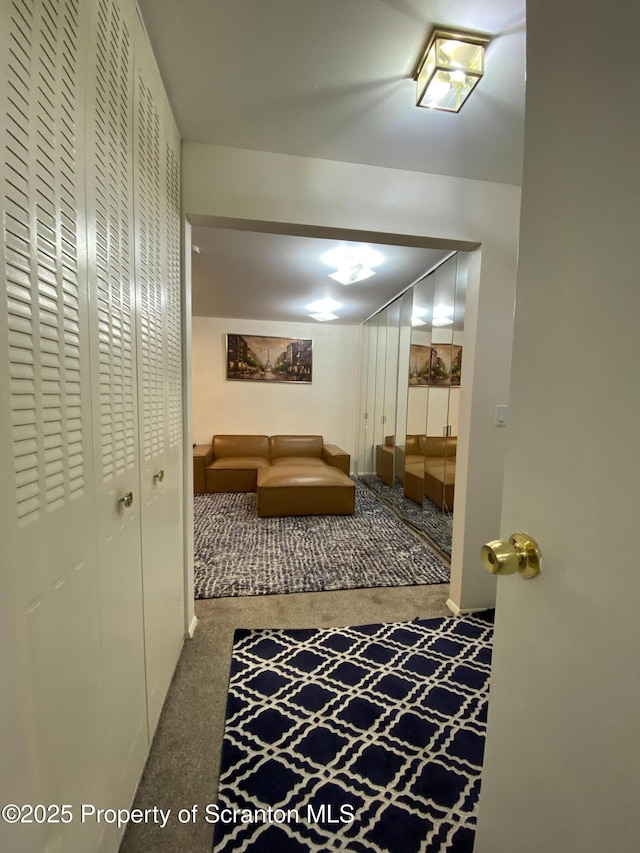 hallway featuring carpet flooring