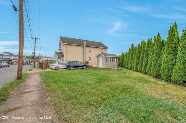 exterior space with a lawn