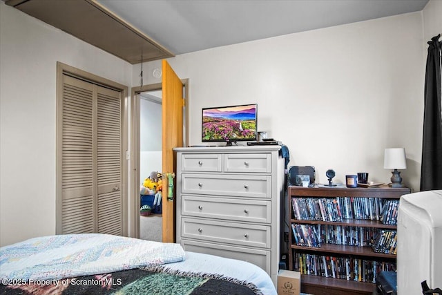180 E Shore Dr, Dingmans Ferry, PA 18328 - bedroom featuring a closet and attic access