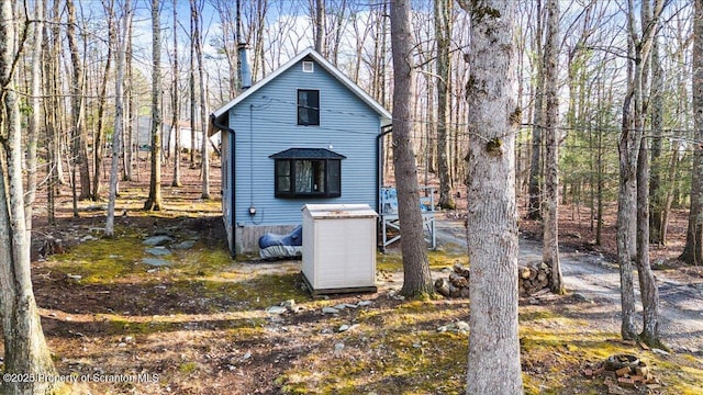 180 E Shore Dr, Dingmans Ferry, PA 18328 - exterior space with a wooded view