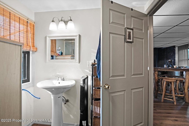 180 E Shore Dr, Dingmans Ferry, PA 18328 - bathroom featuring a drop ceiling and wood finished floors