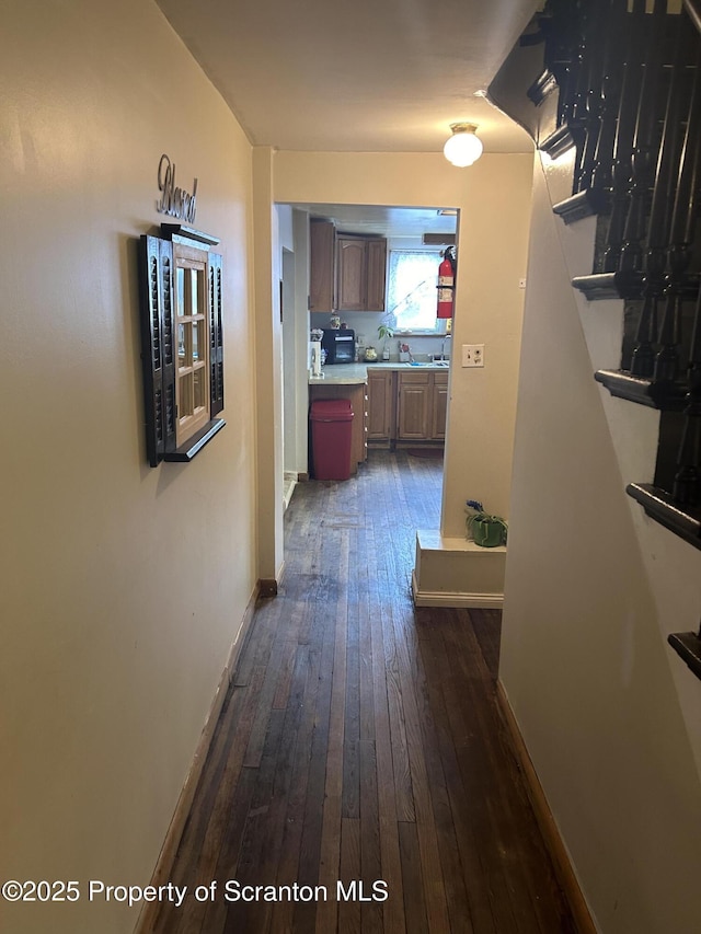 hall featuring dark hardwood / wood-style flooring