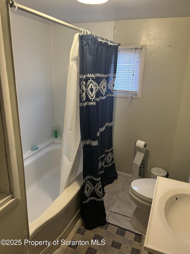 full bathroom with toilet, shower / bathtub combination with curtain, and sink