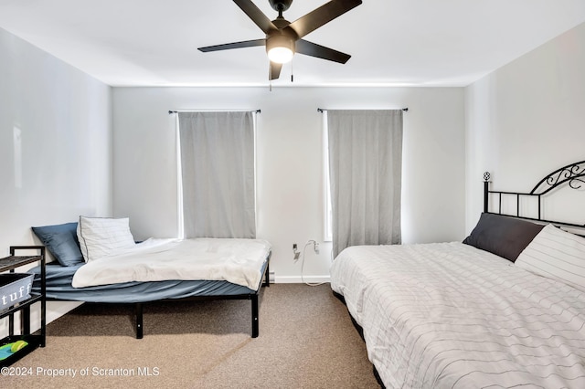 bedroom featuring ceiling fan and carpet floors