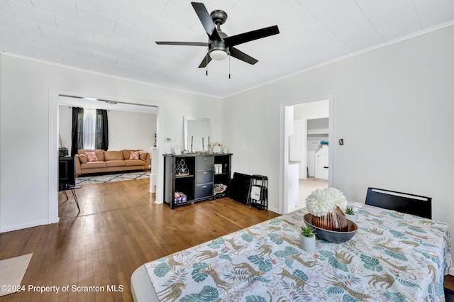 dining room featuring ceiling fan, wood-type flooring, and crown molding