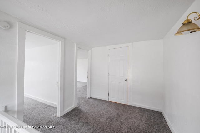 121 Throop St, Scranton, PA 18508 - unfurnished bedroom featuring carpet, a textured ceiling, and baseboards