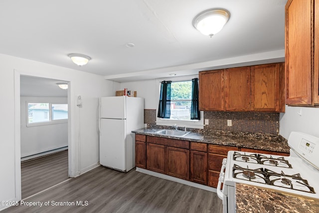 121 Throop St, Scranton, PA 18508 - kitchen featuring white appliances, a baseboard radiator, a sink, dark wood finished floors, and plenty of natural light