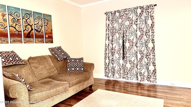 living room with crown molding and hardwood / wood-style flooring