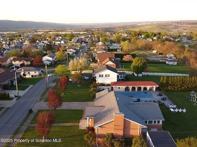 birds eye view of property with a residential view